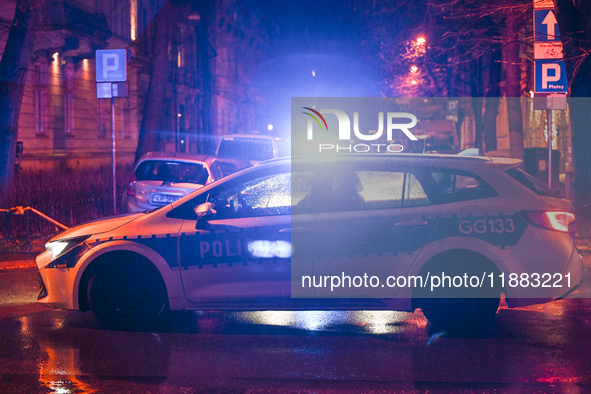 KRAKOW, POLAND - DECEMBER 19:   
Police vehicle blocks Boguslawskiego Street in Krakow’s city center during a security alert at the location...