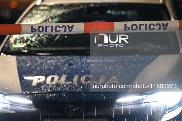 KRAKOW, POLAND - DECEMBER 19:   
Police tape and a police vehicle block Boguslawskiego Street in Krakow’s city center during a security aler...