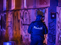 KRAKOW, POLAND - DECEMBER 19:   
Police officer seen standing at Boguslawskiego Street in Krakow’s city center during a security alert at th...