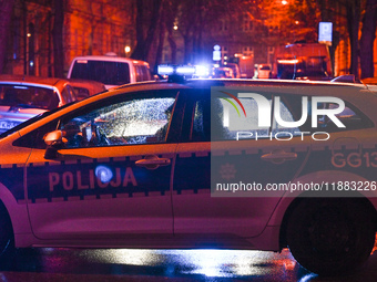 KRAKOW, POLAND - DECEMBER 19:   
Police vehicle blocks Boguslawskiego Street in Krakow’s city center during a security alert at the location...