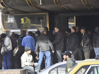 Crowds gather in front of all banks in Syria after a 9-day closure since the fall of the regime on December 19, 2024. (