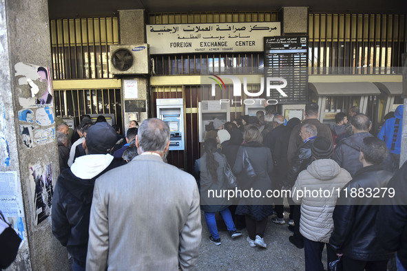 Crowds gather in front of all banks in Syria after a 9-day closure since the fall of the regime on December 19, 2024. 