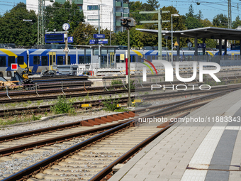 A BRB (Bayerische Regiobahn) train is visible at Platform 4 at Traunstein Train Station in Bavaria, Germany, on September 16, 2023, with var...