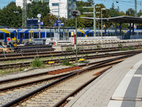 A BRB (Bayerische Regiobahn) train is visible at Platform 4 at Traunstein Train Station in Bavaria, Germany, on September 16, 2023, with var...