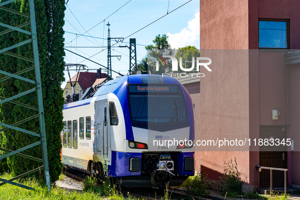 A BRB (Bayerische Regiobahn) train arrives at Traunstein Train Station in Bavaria, Germany, on September 16, 2023 