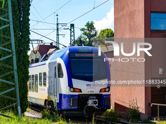 A BRB (Bayerische Regiobahn) train arrives at Traunstein Train Station in Bavaria, Germany, on September 16, 2023 (