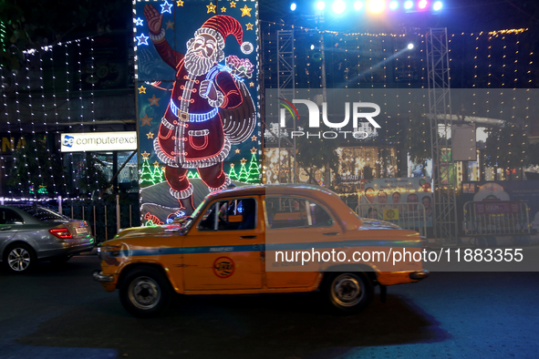 The lighting decoration on Park Street for the upcoming Christmas celebration takes place in Kolkata, India, on December 19, 2024. 