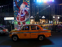 The lighting decoration on Park Street for the upcoming Christmas celebration takes place in Kolkata, India, on December 19, 2024. (