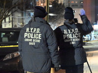 One man is in critical condition and another man is wounded in a shooting in the Flushing section of Queens, New York, United States, on Dec...