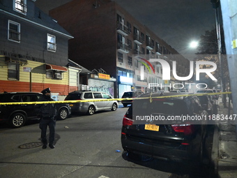 One man is in critical condition and another man is wounded in a shooting in the Flushing section of Queens, New York, United States, on Dec...