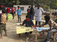 Bangladesh Gach Raksha Andolan, an organization that works on environmental issues, holds a red alert program to demand the control of air p...