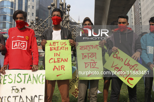 Bangladesh Gach Raksha Andolan, an organization that works on environmental issues, holds a red alert program to demand the control of air p...