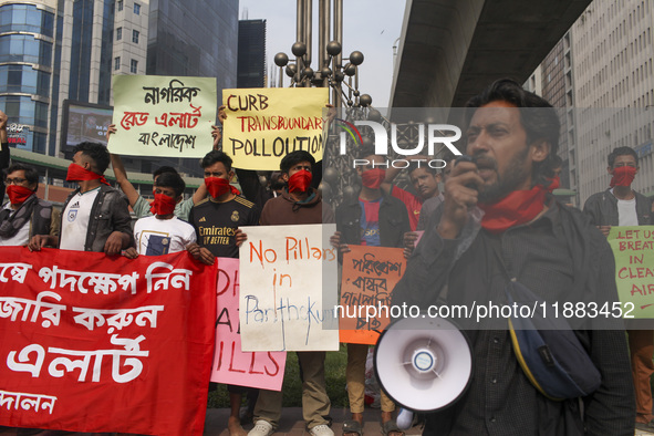 Bangladesh Gach Raksha Andolan, an organization that works on environmental issues, holds a red alert program to demand the control of air p...