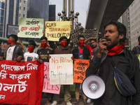 Bangladesh Gach Raksha Andolan, an organization that works on environmental issues, holds a red alert program to demand the control of air p...