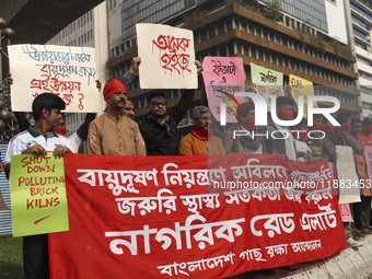 Bangladesh Gach Raksha Andolan, an organization that works on environmental issues, holds a red alert program to demand the control of air p...