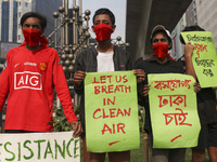 Bangladesh Gach Raksha Andolan, an organization that works on environmental issues, holds a red alert program to demand the control of air p...