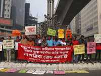 Bangladesh Gach Raksha Andolan, an organization that works on environmental issues, holds a red alert program to demand the control of air p...