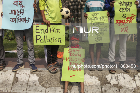 Bangladesh Gach Raksha Andolan, an organization that works on environmental issues, holds a red alert program to demand the control of air p...