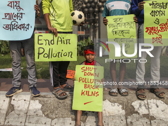 Bangladesh Gach Raksha Andolan, an organization that works on environmental issues, holds a red alert program to demand the control of air p...