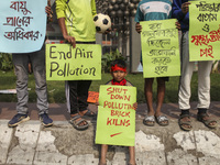 Bangladesh Gach Raksha Andolan, an organization that works on environmental issues, holds a red alert program to demand the control of air p...