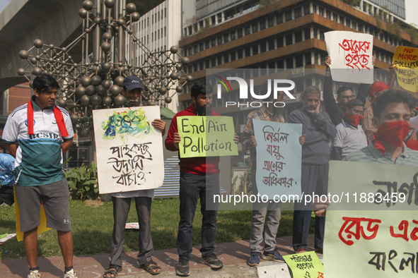 Bangladesh Gach Raksha Andolan, an organization that works on environmental issues, holds a red alert program to demand the control of air p...