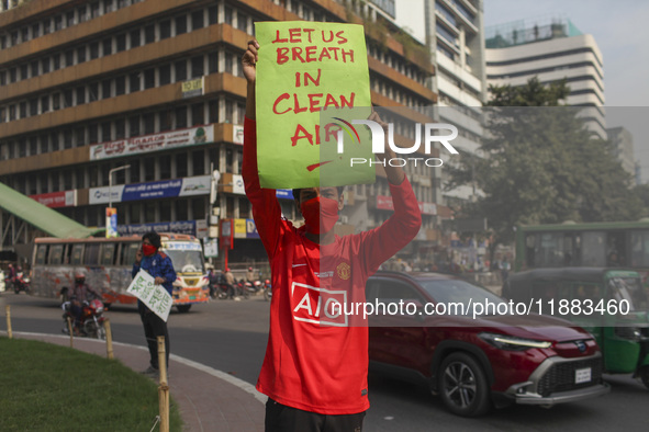 Bangladesh Gach Raksha Andolan, an organization that works on environmental issues, holds a red alert program to demand the control of air p...