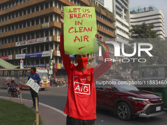 Bangladesh Gach Raksha Andolan, an organization that works on environmental issues, holds a red alert program to demand the control of air p...