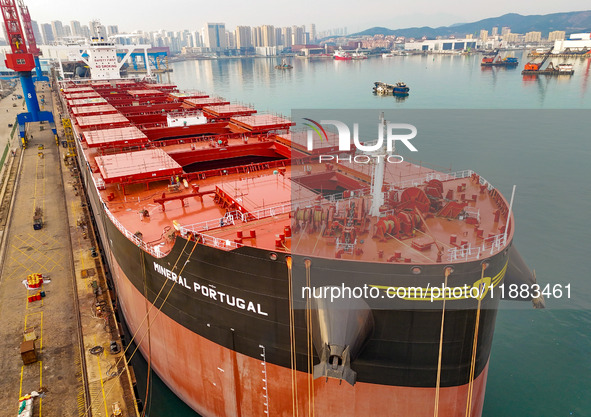 A large ship is about to be delivered at China State Shipbuilding Corporation Qingdao Beihai Shipbuilding Co LTD in Qingdao, China, on Decem...