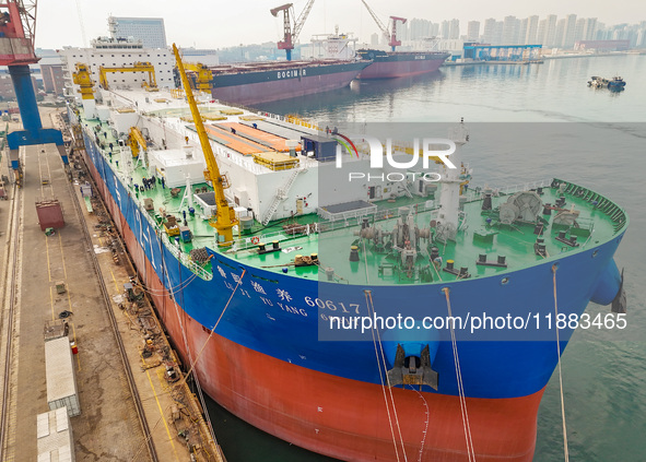 A large ship is about to be delivered at China State Shipbuilding Corporation Qingdao Beihai Shipbuilding Co LTD in Qingdao, China, on Decem...