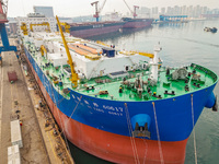 A large ship is about to be delivered at China State Shipbuilding Corporation Qingdao Beihai Shipbuilding Co LTD in Qingdao, China, on Decem...