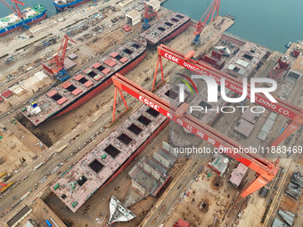 Multiple large ships are under construction simultaneously at China Shipbuilding Corporation Qingdao Beihai Shipbuilding Co., Ltd., in Qingd...