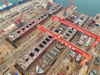 Multiple large ships are under construction simultaneously at China Shipbuilding Corporation Qingdao Beihai Shipbuilding Co., Ltd., in Qingd...