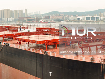 A large ship is about to be delivered at China State Shipbuilding Corporation Qingdao Beihai Shipbuilding Co LTD in Qingdao, China, on Decem...