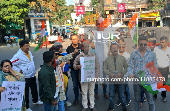 Congress supporters shout slogans against Home Minister Amit Shah's remarks related to Dr. B R Ambedkar in Siliguri, India, on December 20,...