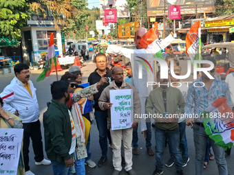 Congress supporters shout slogans against Home Minister Amit Shah's remarks related to Dr. B R Ambedkar in Siliguri, India, on December 20,...