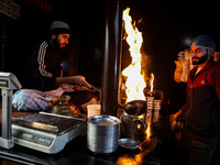 Harissa is prepared and served to customers on a cold winter day in Srinagar, Jammu and Kashmir, India, on December 20, 2024. This tradition...