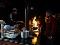 Harissa is prepared and served to customers on a cold winter day in Srinagar, Jammu and Kashmir, India, on December 20, 2024. This tradition...