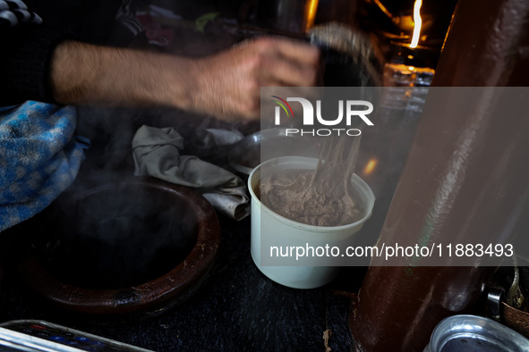 Harissa is prepared and served to customers on a cold winter day in Srinagar, Jammu and Kashmir, India, on December 20, 2024. This tradition...