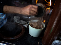 Harissa is prepared and served to customers on a cold winter day in Srinagar, Jammu and Kashmir, India, on December 20, 2024. This tradition...