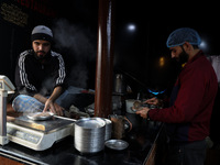 Harissa is prepared and served to customers on a cold winter day in Srinagar, Jammu and Kashmir, India, on December 20, 2024. This tradition...