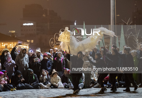 Young Iranian puppeteers perform in a festival in the Abasabad tourism zone in central Tehran, Iran, on December 19, 2024. 