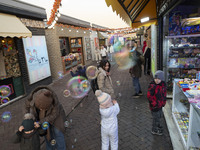 Iranian families visit the Abasabad tourism zone in central Tehran, Iran, on December 19, 2024. (