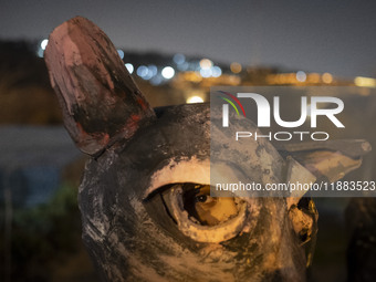 A young Iranian puppeteer wears a mouse-shaped mask and waits to perform at a festival in the Abasabad tourism zone in central Tehran, Iran,...