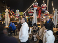 Iranian families visit the Abasabad tourism zone in central Tehran, Iran, on December 19, 2024. (