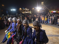 An Iranian Kurd puppeteer performs a traditional Kurdish dance with puppets during a festival in the Abasabad tourism zone in central Tehran...