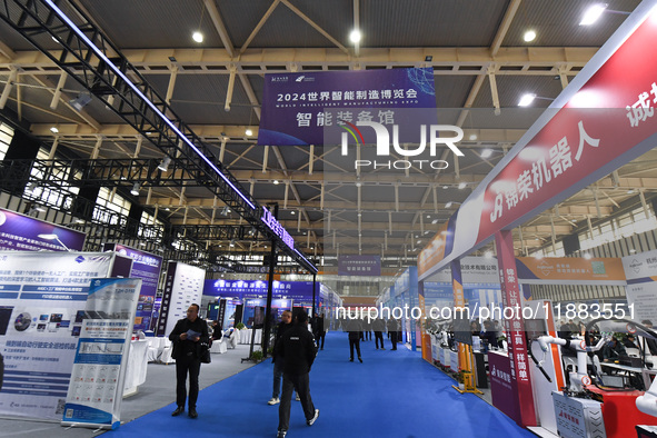 People visit the 2024 World Intelligent Manufacturing Conference in Nanjing, China, on December 20, 2024. 