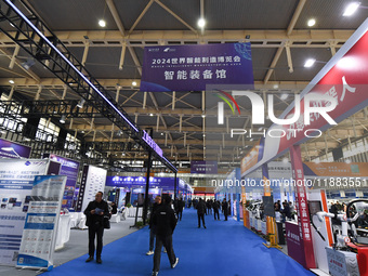 People visit the 2024 World Intelligent Manufacturing Conference in Nanjing, China, on December 20, 2024. (