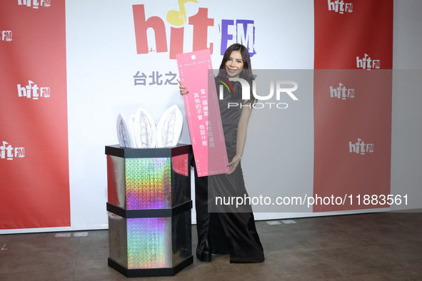 Taiwanese female singer Eve Ai attends a radio event to promote her new album in Taipei, Taiwan, on December 20, 2024. 