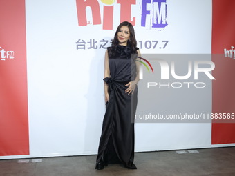 Taiwanese female singer Eve Ai attends a radio event to promote her new album in Taipei, Taiwan, on December 20, 2024. (