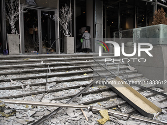 Destruction and damage to residential and office buildings occur as a result of a Russian missile strike in central Kyiv, Ukraine, on Decemb...